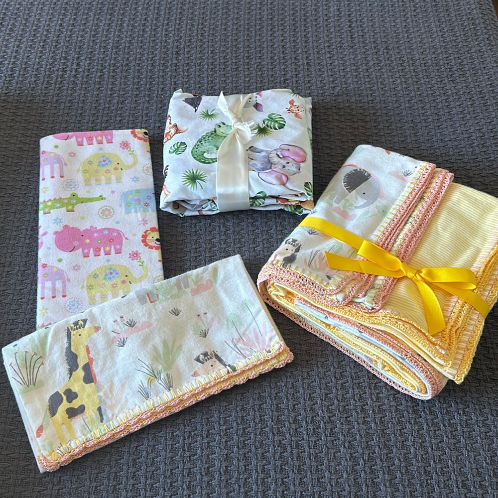 Assorted baby cloths, burp cloths, or blanket